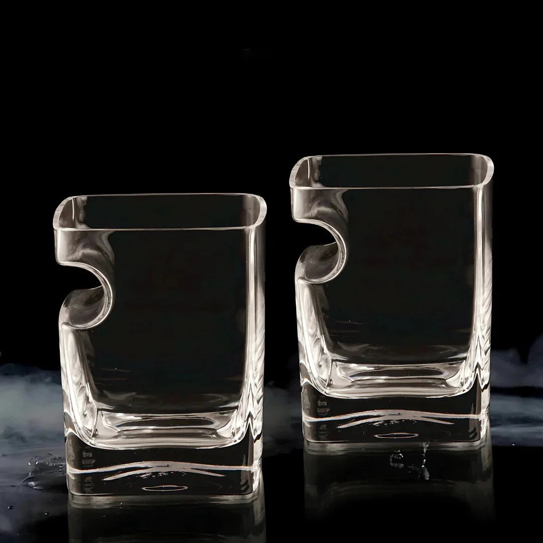 The Cigar Holding Whiskey Glass