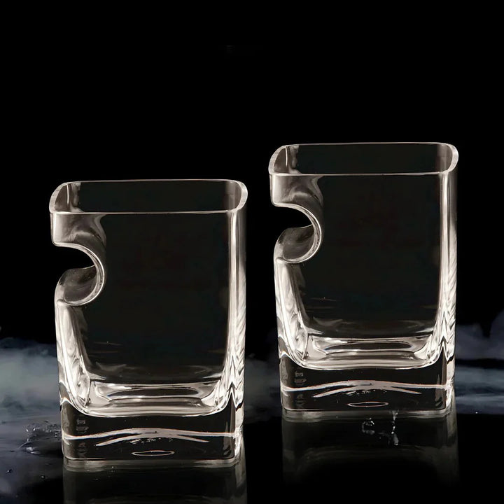 The Cigar Holding Whiskey Glass