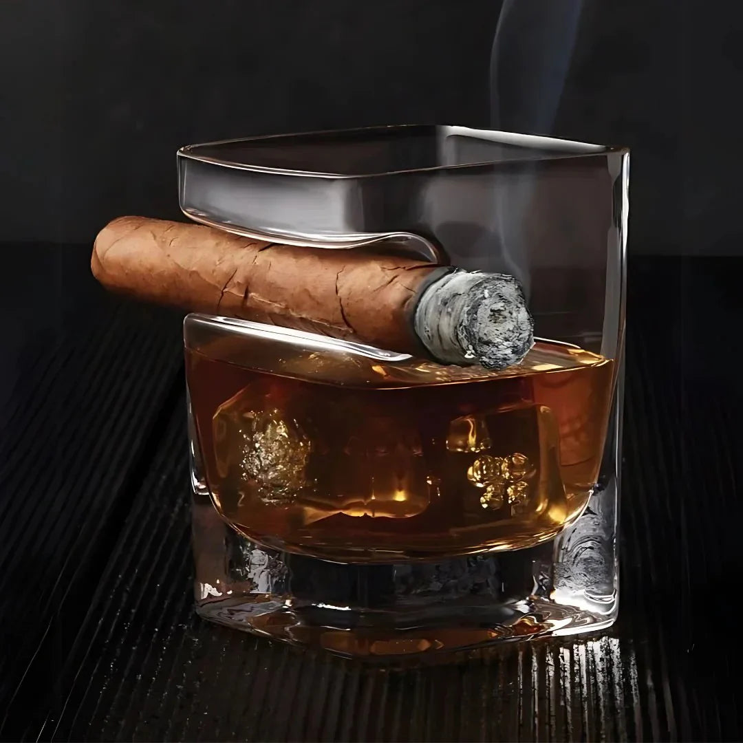 The Cigar Holding Whiskey Glass
