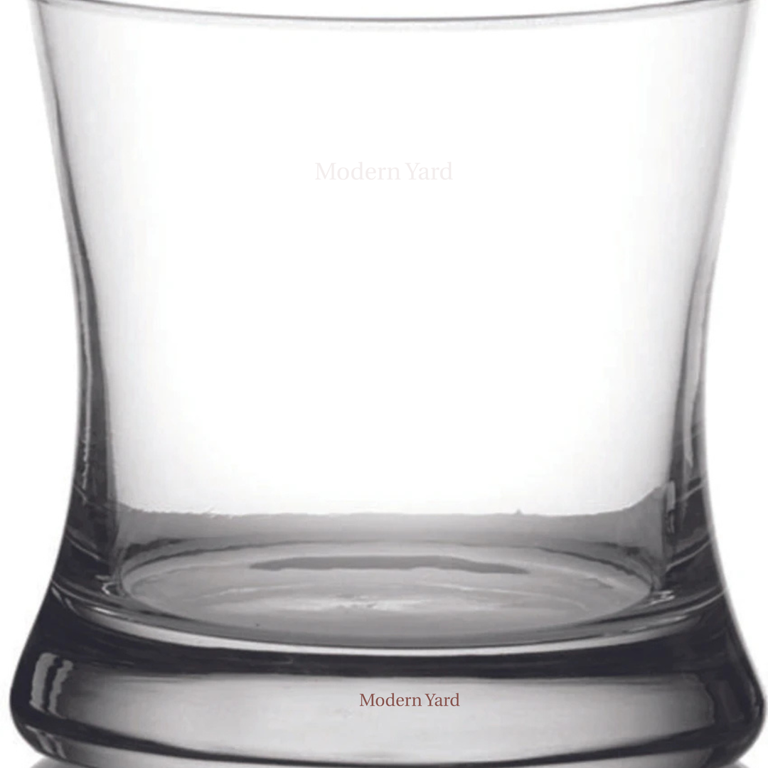 Designer crystal rocks glass with sleek modern curves perfect for whiskey, scotch and cocktail presentation and Home Bar Setup
