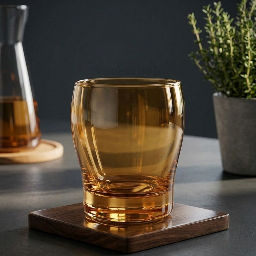 Elegant honey gold crystal drinking glass with minimalist contemporary styling