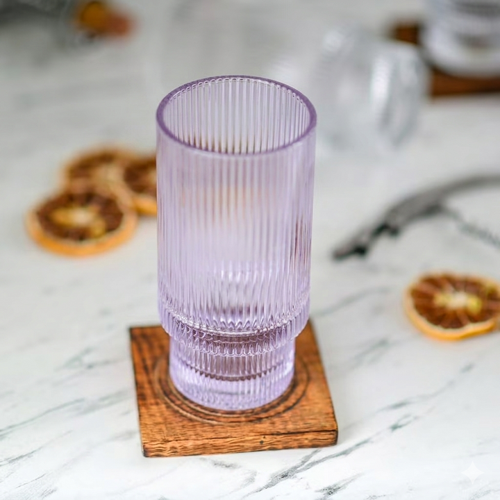 Premium aqua highball glass featuring vertical ribbed texture and contemporary design