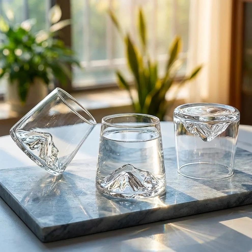 Luxury Old Fashioned whiskey glass featuring mountain-inspired heavy base design.