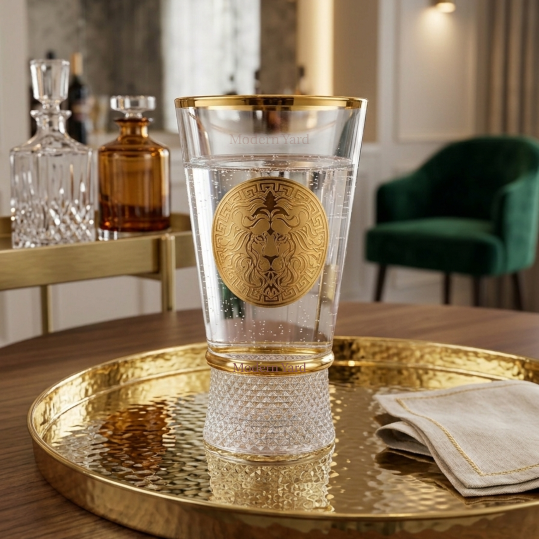 Premium gold rim highball glass featuring royal lion emblem and crystal textured base by Modern Yard.