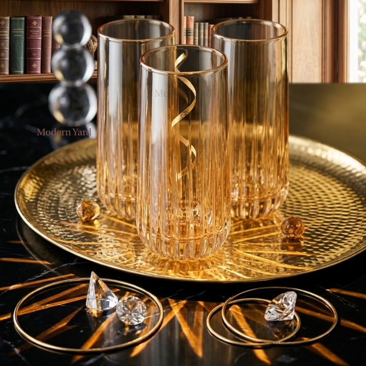 Modern Yard amber whiskey glasses with stylish gold tinted transparent finish.